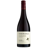 A bottle of Oakridge Hazeldene Gradydale red wine, featuring a dark glass bottle with a cream-colored label and a dark red foil capsule, set against a plain white background.