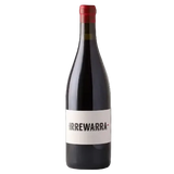 Wine bottle with a red cap and white label on a black background