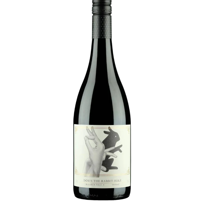 Wine bottle with a label featuring artistic design on a white background