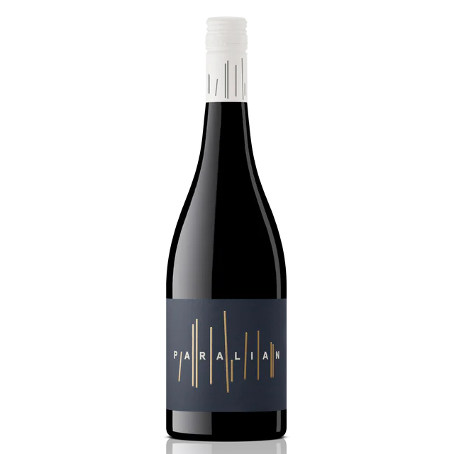 Wine bottle with 'Paralian' label on a white background