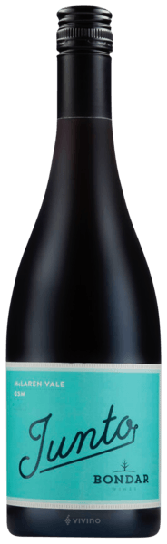Wine bottle with 'Junto' label on a blue background